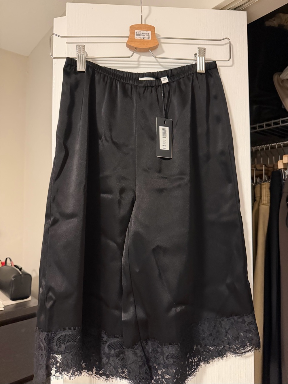 Aritzia Black Satin Midi Skirt with Lace Hem
